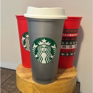 Three Starbucks Plastic Holiday Cups with Lids + two extra cups